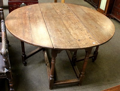 Lot 1134 - An 18th Century Oak Gateleg Table, 138cm by...