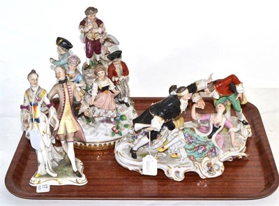 Lot 217 - German porcelain figural group 'Hide and Seek' another on circular base of children dancing to...