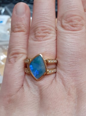 Lot 2003 - A Composite Opal and Diamond Ring the...