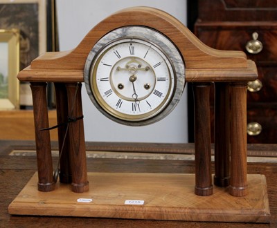 Lot 1215 - A Rosewood Striking Portico Mantel Clock, the...