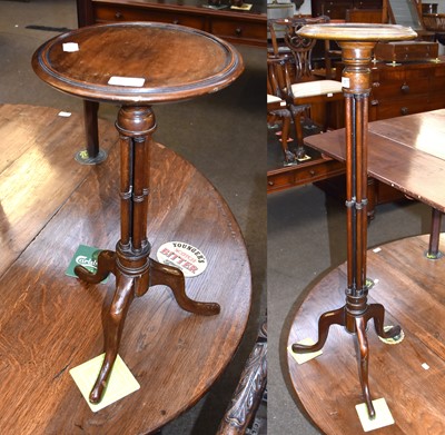 Lot 1138 - A Mahogany Torchere, the moulded circular top...