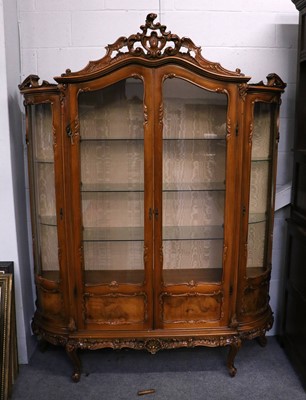 Lot 1279 - A Modern French Carved Walnut Display Cabinet,...