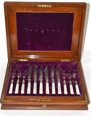 Lot 230 - Cased set of twelve silver dessert eaters with mother of pearl handles