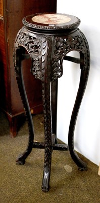 Lot 1080 - A Chinese Carved Hardwood Jardiniere Stand,...