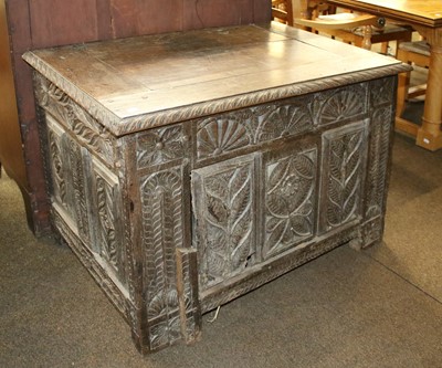 Lot 1148 - A 17th Century Carved Oak Blanket Chest, with...