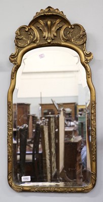 Lot 1092 - A 1920's Gilt Framed Mirror, in Rococo style,...