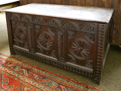 Lot 1216 - An 18th Century Three Panel Oak Coffer, carved...