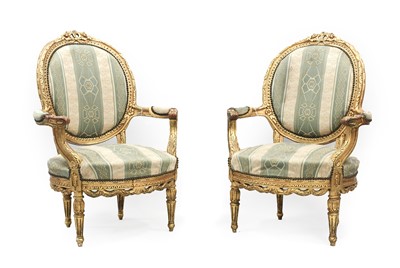 Lot 817 - A Pair of Louis XVI Style Giltwood Fauteuils,...