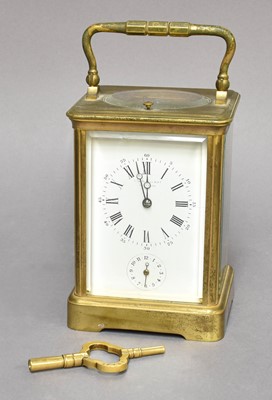 Lot 264 - A Brass Strike and Repeat Alarm Carriage Clock,...