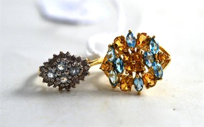 Lot 298 - A 9ct gold aquamarine and diamond cluster ring and a 9ct gold citrine and topaz cluster ring (2)