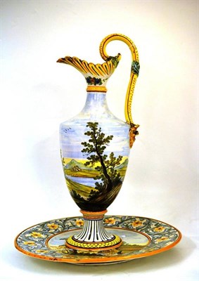 Lot 103 - A Lorenzo and Dante Pardi, Castelli Maiolica Ewer and Charger, 20th century, painted in colours...