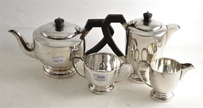 Lot 309 - A silver four piece tea service, Birmingham 1947, with original receipt