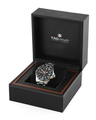 Lot 2189 - Tag Heuer: A Stainless Steel Calendar Centre...