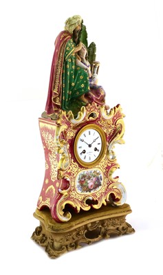 Lot 82 - A French Porcelain Figural Mantel Clock in the...