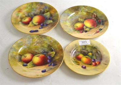 Lot 323 - Four Royal Worcester fruit painted plates, signed W H Austin (x2), A Shuck and one unsigned (4)