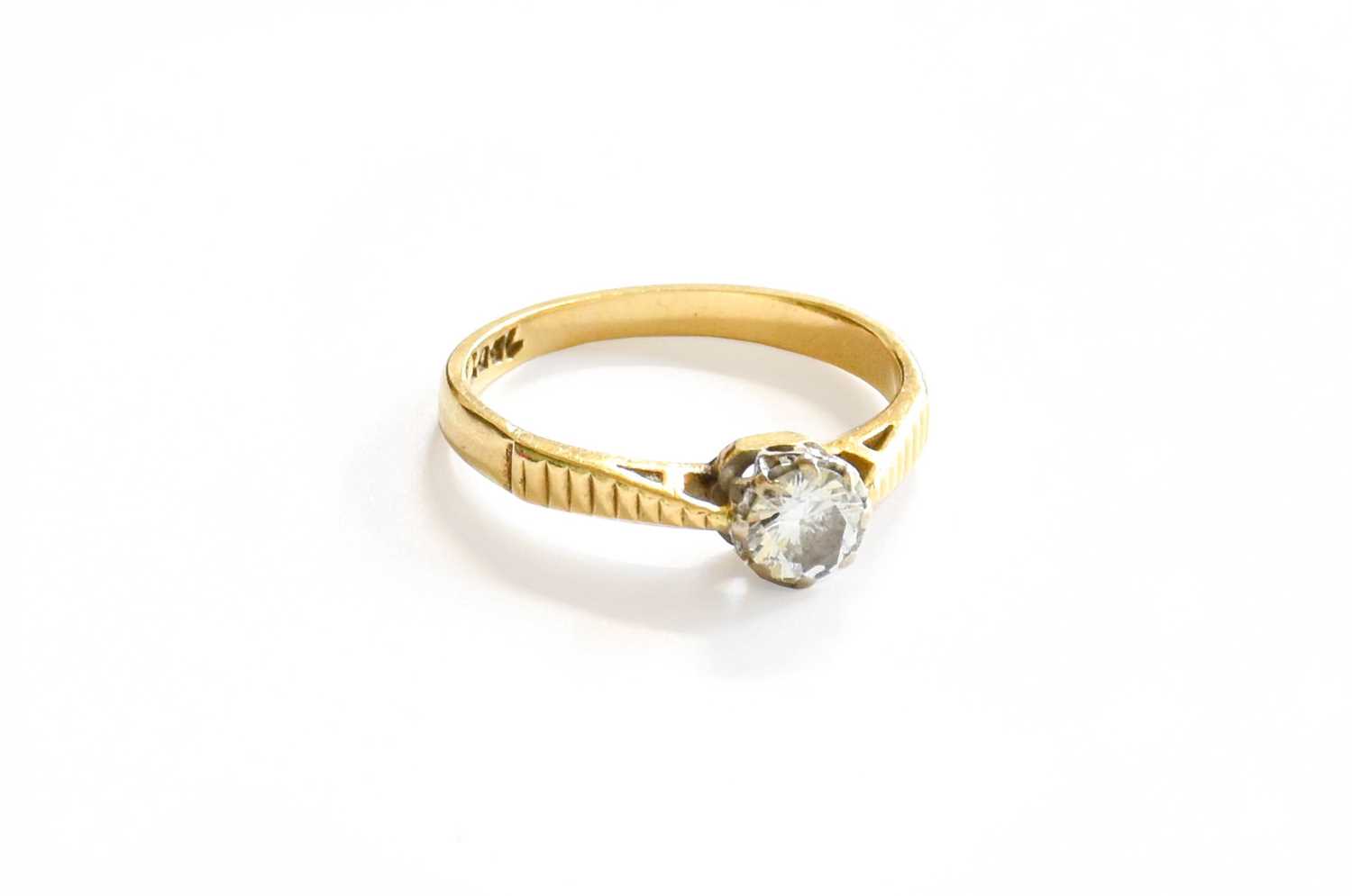 Lot 38 - A Diamond Solitaire Ring, the round brilliant...