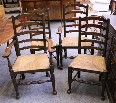 Lot 1130 - A Set of Four Ladder Back and Rush Seated...