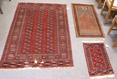 Lot 1171 - An Anatolian Prayer Rug, the terracotta...