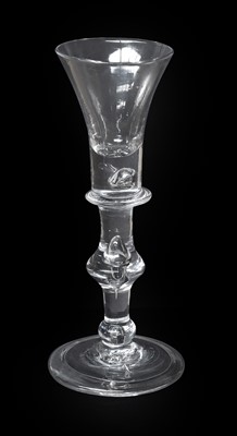 Lot 1 - A Baluster Wine Glass, circa 1720, the trumpet...