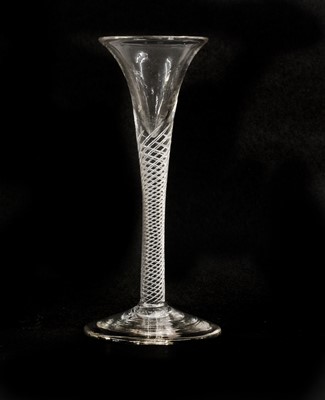 Lot 16 - A Cordial Glass, circa 1750, the drawn trumpet...