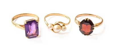 Lot 101 - A 9 Carat Gold Amethyst Ring, finger size P; A...