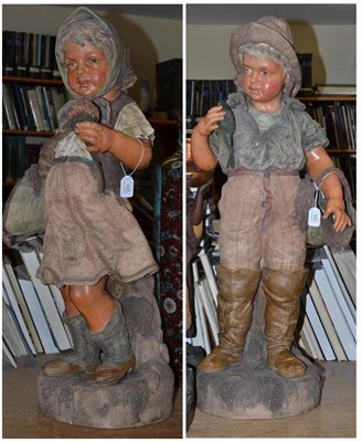 Lot 107 - A Pair of Continental Polychrome Pottery Life Size Figures of Children, circa 1900, as a little boy