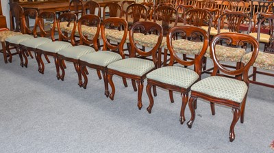 Lot 1243 - A Set of Eight Victorian Mahogany Balloon Back...