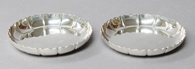 Lot 42 - A Pair of Elizabeth II Silver Counter-Dishes,...