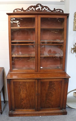 Lot 1192 - A George III Mahogany Bookcase, the glazed...