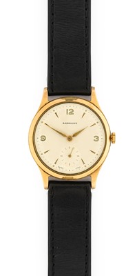 Lot 2290 - Garrard: A 9 Carat Gold Wristwatch, retailed...