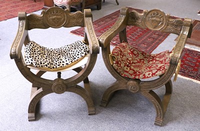 Lot 1104 - A Pair of 20th Century Carved Savonarola Chairs