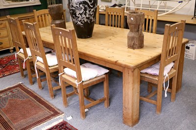 Lot 1100 - A Large Country Kitchen Pine Table, raised on...