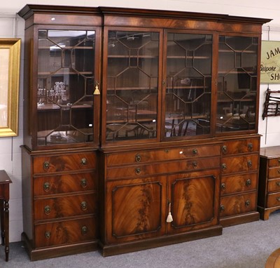 Lot 1162 - A Reproduction Mahogany Break Front Bookcase,...