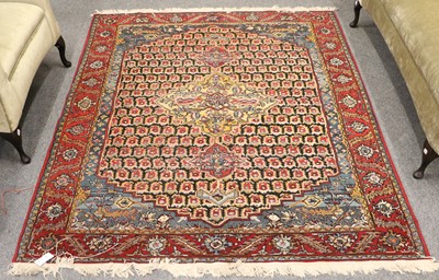 Lot 1008 - A Machine Made Carpet of Oriental Design, the...