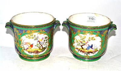 Lot 110 - A Pair of Sèvres Style Porcelain Cache Pots, with scroll handles, painted with exotic birds in...