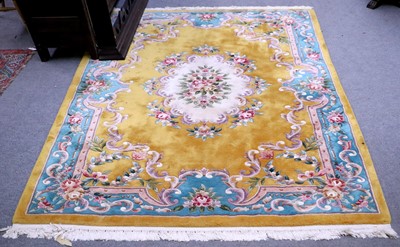 Lot 1188 - A Chinese Carved Carpet, with a mustard field...