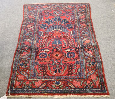 Lot 1002 - A Hamadan Rug, with a strawberry field with...