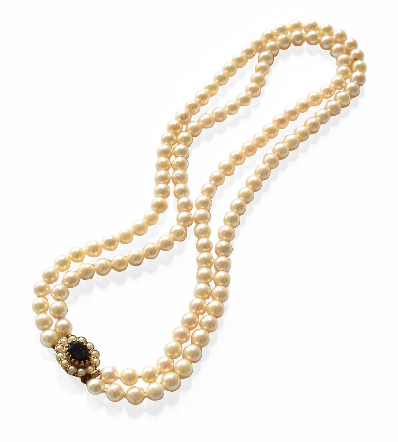 Lot 207 - A Two Row Cultured Pearl Necklace, knotted to...