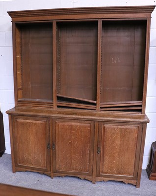 Lot 1215 - An Early 20th Century Oak Bookcase Cabinet,...