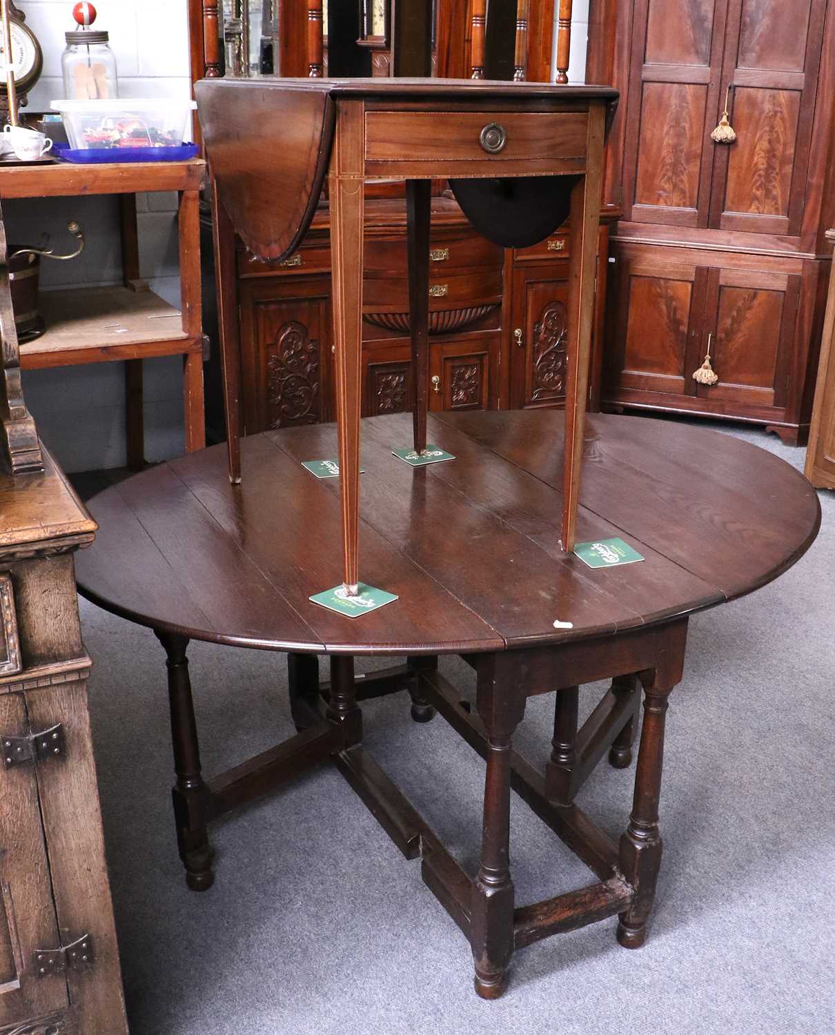 Lot 1221 - An 18th Century Oak Gateleg Dining Table,...