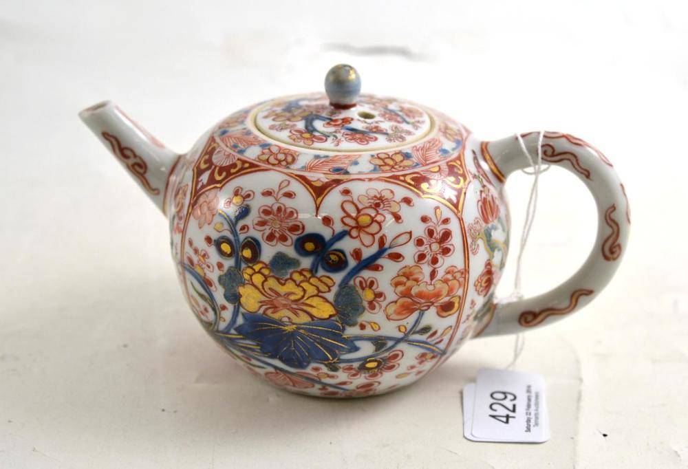 Lot 429 - A Chinese blue and white porcelain 'clobbered' teapot and cover
