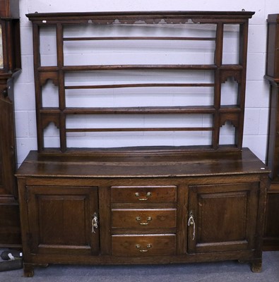 Lot 1193 - An 18th century Oak Dresser and Rack, with two...