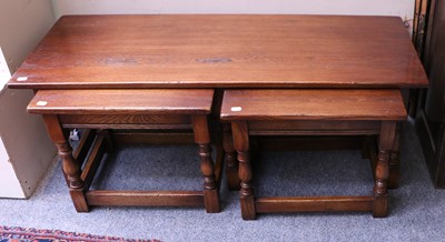 Lot 1156 - A Nest of Three Oak Table in Titchmarsh &...