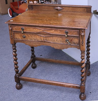 Lot 1240 - A 1920s Oak Canteen Table, fitted with two...