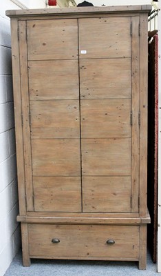 Lot 1142 - A Barker & Stonehouse Wardrobe, the upper...