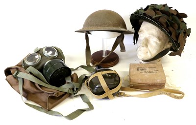 Lot 106 - A Second World War Brodie Combat Helmet, with...