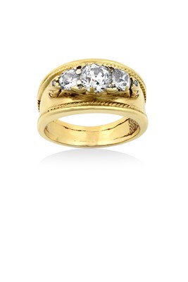 Lot 2249 - A Diamond Three Stone Ring the graduated old...