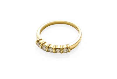 Lot 268 - An 18 Carat Gold Diamond Five Stone Ring, the...