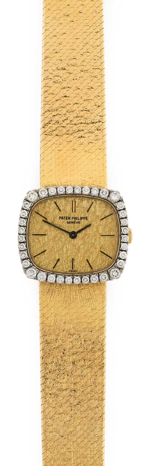 Lot 2192 - Patek Philippe: A Lady's 18 Carat Gold Diamond...