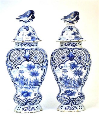 Lot 120 - A Pair of Dutch Delft Blue and White Shouldered Baluster Vases and Covers, 19th century, with...